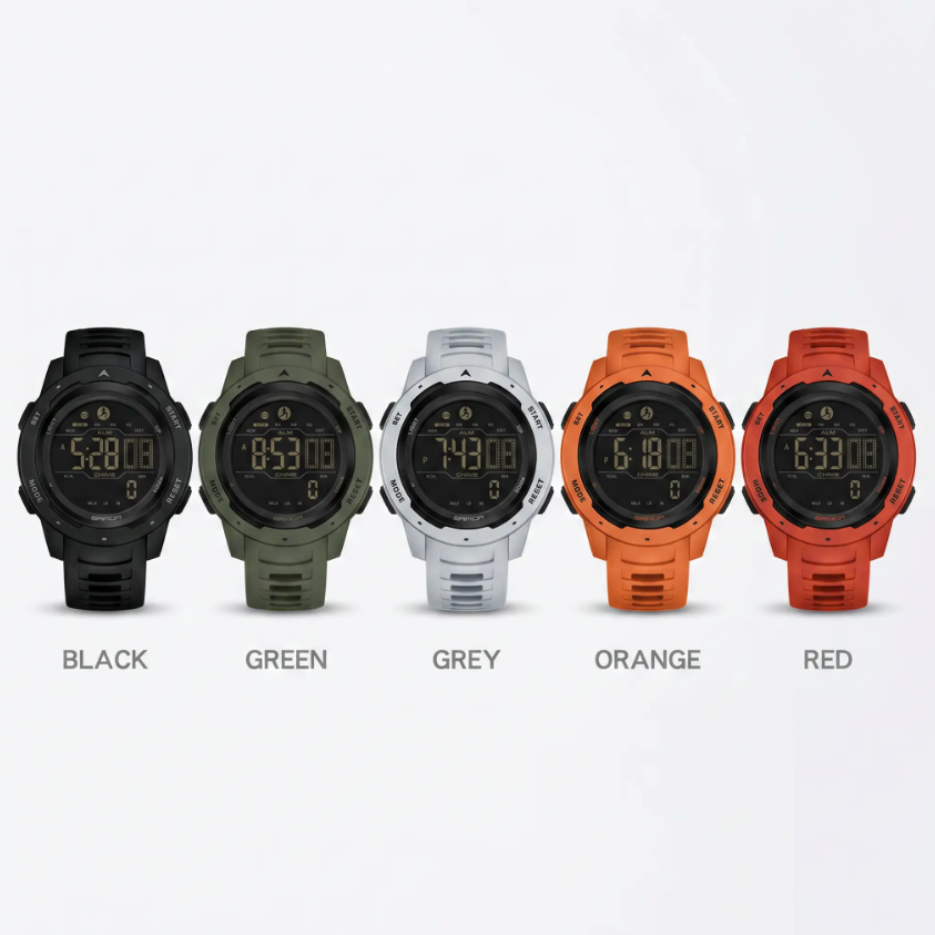 Five digital sports watches shown side by side in different colors: black, green, grey, orange, and red, with text labels underneath on a light background.